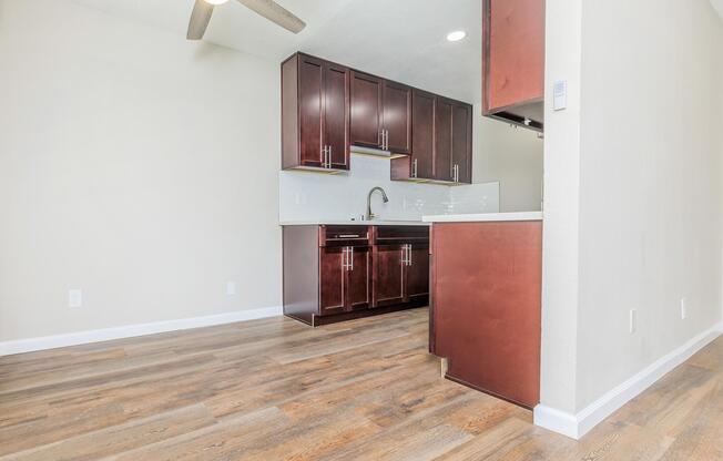 a kitchen with a wooden floor