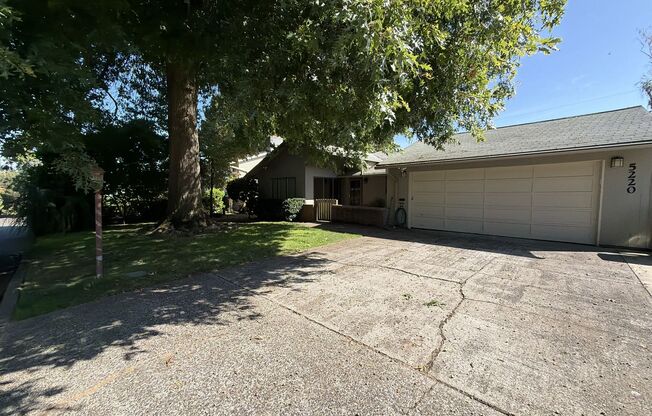 Spacious 3 Bedroom Home with Multiple Living Areas, Two Fireplaces, Hardwood Floors & Outdoor Patio