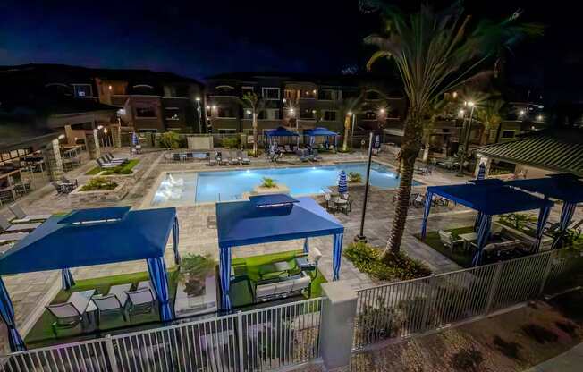 Overhead night shot of Level 25 at The Curve's resort style pool.