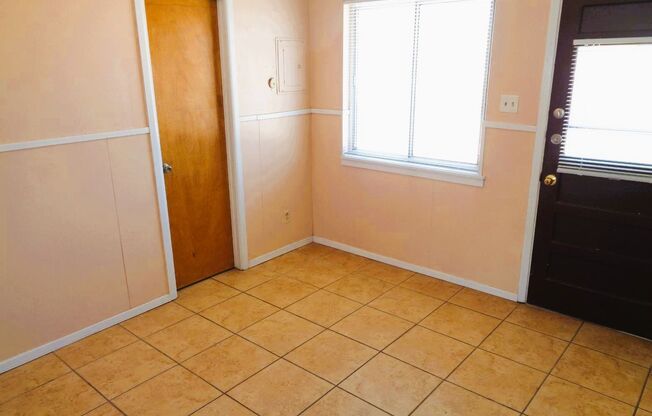 Cute Single Level Northeast Home With Refrigerated Air Located In Quiet Neighborhood