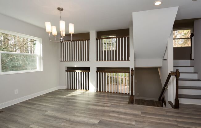 This gorgeous duplex, with its open concept floor plan and 4 bed/2.5 bath,