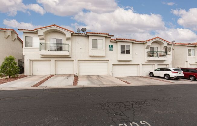 Two bedroom with two car garage in gated community with pool/spa