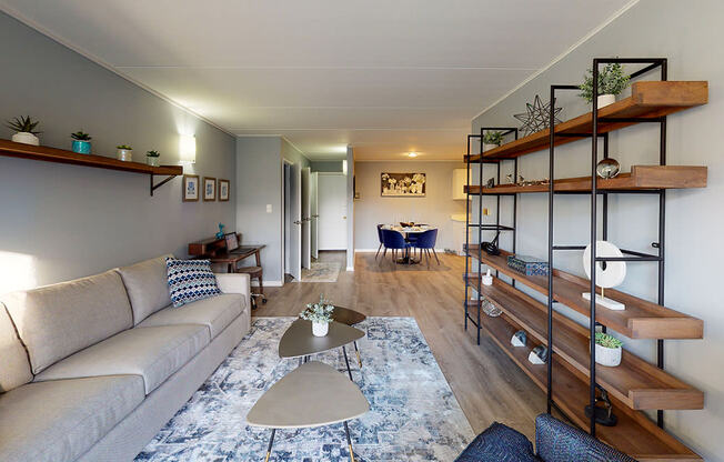 a living room with a couch and a table