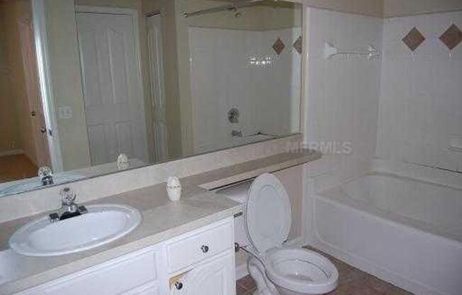 Spacious  and nice 2nd floor 2bed/1bath unit in the sought after Grand Key in South Tampa!