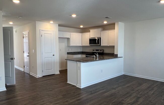 Beautiful New Construction 3 bedroom 2.5 Condo   with garage- Water, trash & sewer incuded!