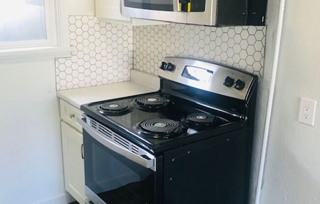 Updated with Stainless steel appliances and air conditioner