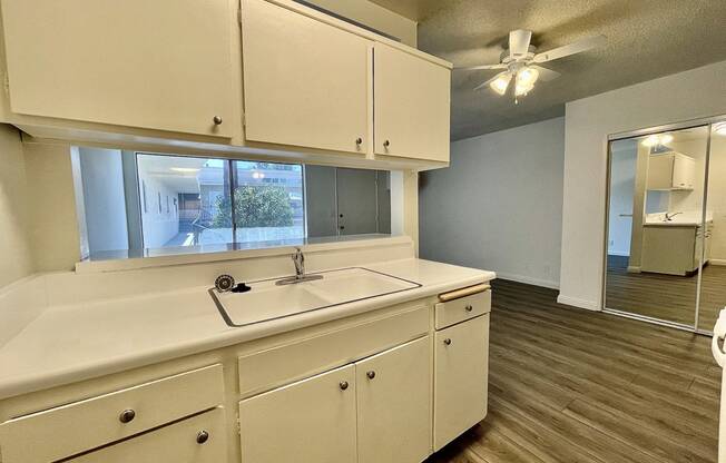 Kitchen with White Appliances and White Cabinets