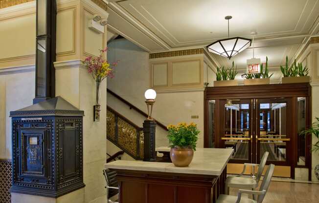 a dining room with a table and chairs and a fireplace