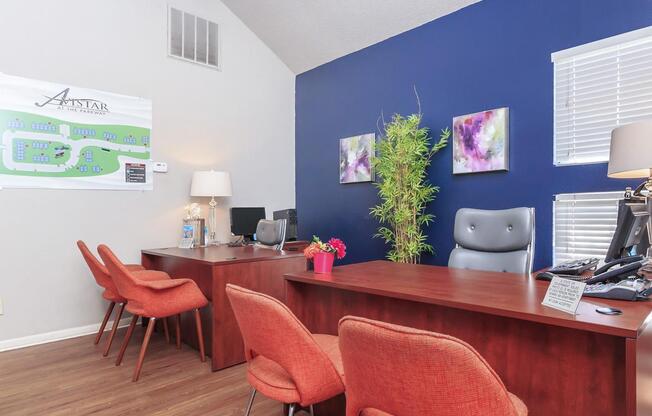 a living room filled with pink flowers on a table