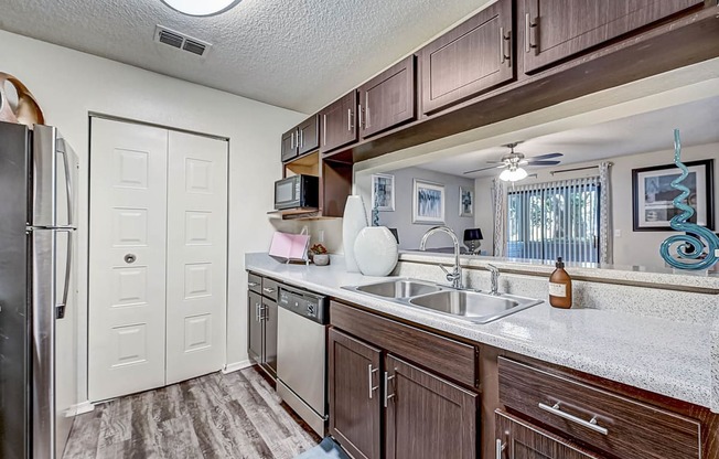 our apartments have a modern kitchen with stainless steel appliances at St. Johns Forest Apartments, Florida, 32277