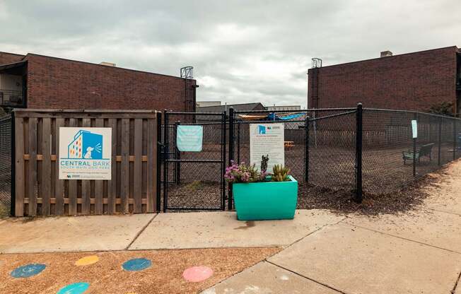 A fenced area with a sign that says Central Bank.