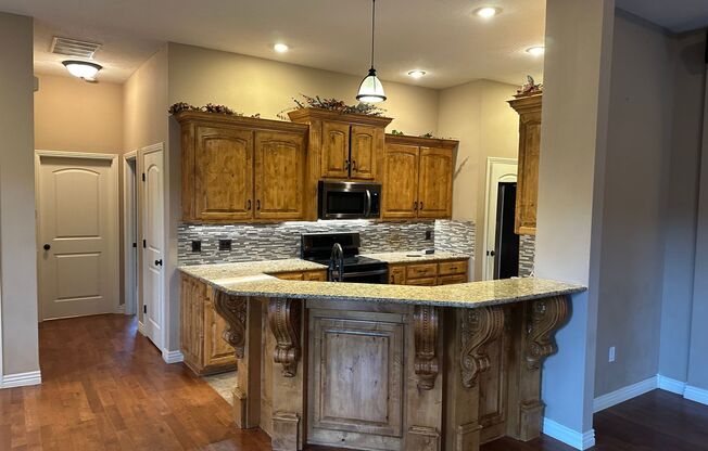 An Exceptional Corner-Lot Estate with Resort Amenities & Spa-Inspired Living