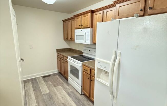 Four Bedroom Near Downtown Available for Pre-Lease!