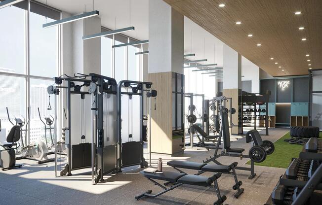 Club-quality fitness studio with TRX station accessible 24/7 at Modera Riverside in Miami, FL.