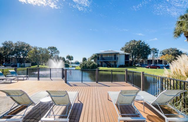 Lounge in the sunshine on the deck | Lakes at Suntree