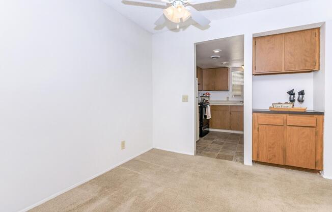 a kitchen with a sink and a mirror