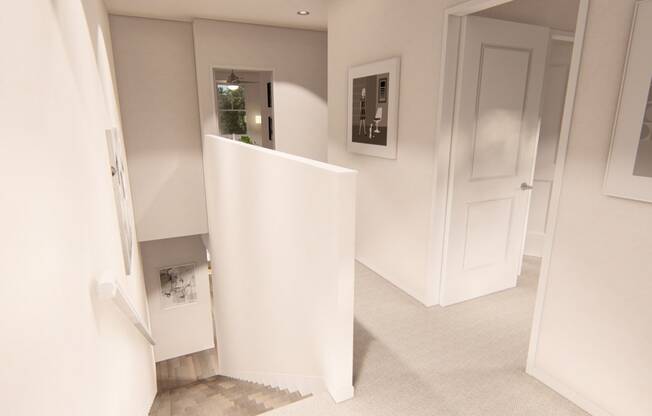 a view down the hall from the top of the stairs at Brownstones at Palisade Park Townhomes, Broomfield, CO