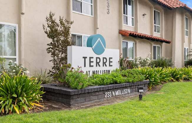 A sign for Terre at Nollison in front of a building.