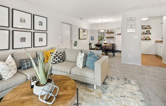a living room with a couch and a table