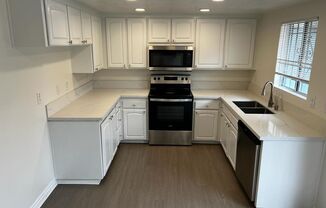 2 Bedroom Remodeled Townhome with Patio/Yard & Laundry Hookups/Garage.