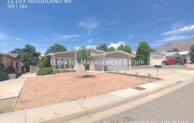 12109 WOODLAND NE