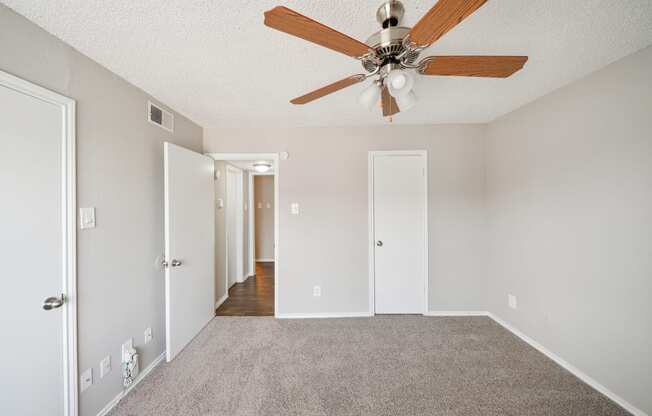 Bedroom with Ceiling Fan at Polaris Apartment Homes in Irving, Texas, TX