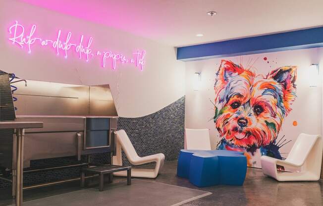 a painting of a dog on a wall in a hospital lobby