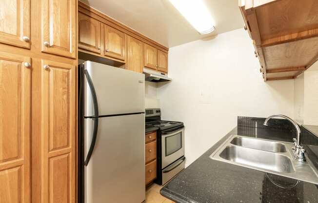 Kitchen with Stainless Steel Appliances and Wood Cabinets