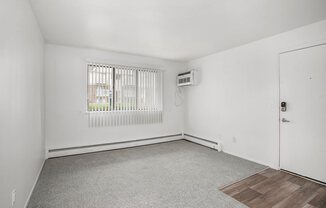 garden style living room with a window