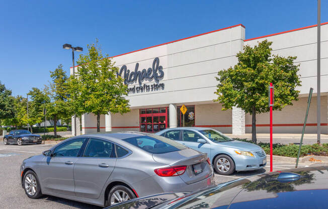 a car dealership with cars parked in front of it at Fairmont at South Lake, Bowie, Maryland