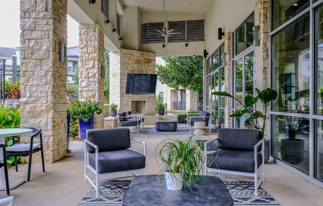 outdoor living area with comfortable seating at The Allure apartments