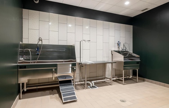 A kitchen with a stainless steel sink and counter.