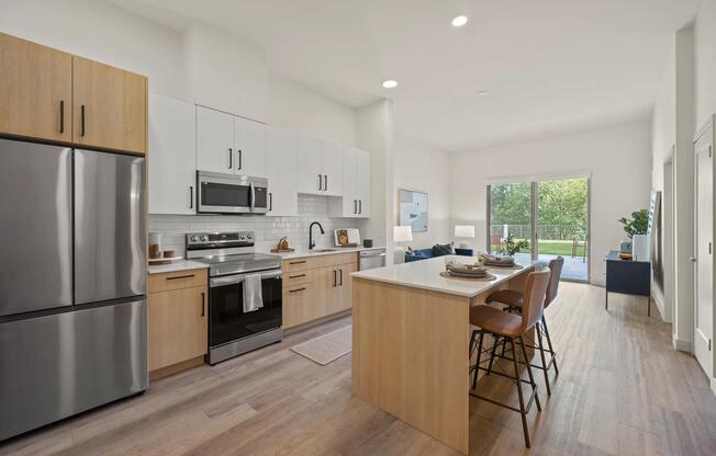 Kitchens feature large chef’s island with built-in storage.