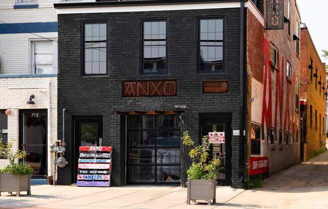 A black building with the word