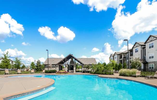 Copperfield apartments swimming  pool with poolside lounging