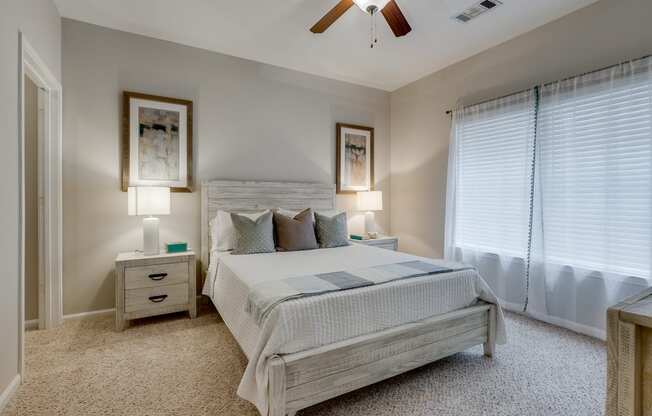 Carpeted Bedroom With Tall Ceilings