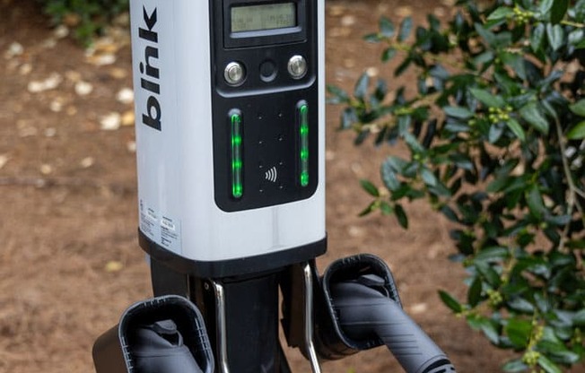 a power meter with two cords plugged into it