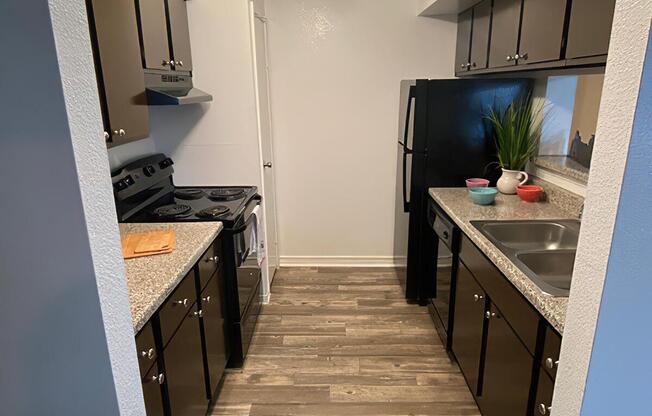 a modern kitchen with stainless steel appliances