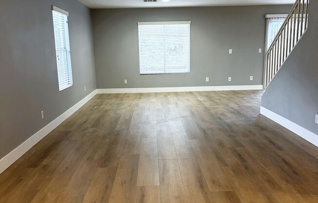 North Summerlin home with open floor plan and large kitchen area! New vinyl plank flooring!