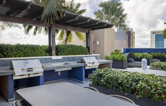 VU New River - Outside Grills with Seating and Lounge Day Beds