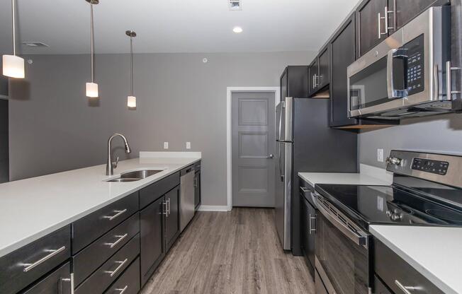 a modern kitchen with stainless steel appliances