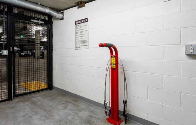 Pet-Friendly Apartments in Nob Hill Portland, OR - The Cordelia - Parking Garage with Bike Repair Center, Gated Entry, and Outlets