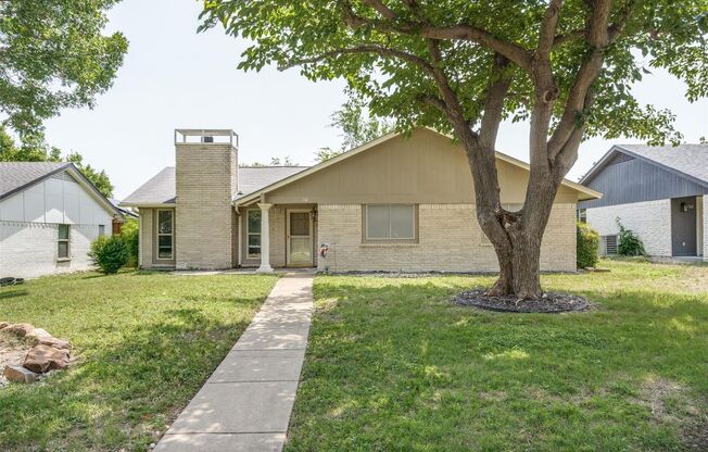 Charming Plano Home with Spacious Yard & Prime Location