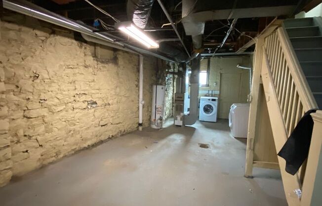 Updated 2BR Row Home in Lawrenceville – Central Air, Pets Welcome, Private Yard & Basement!