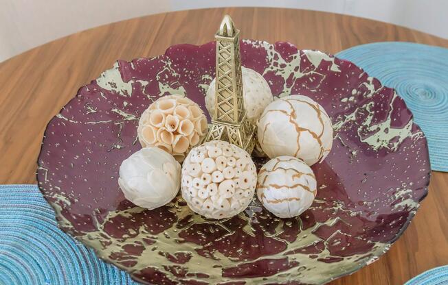 a plate with some cake sitting on top of a table