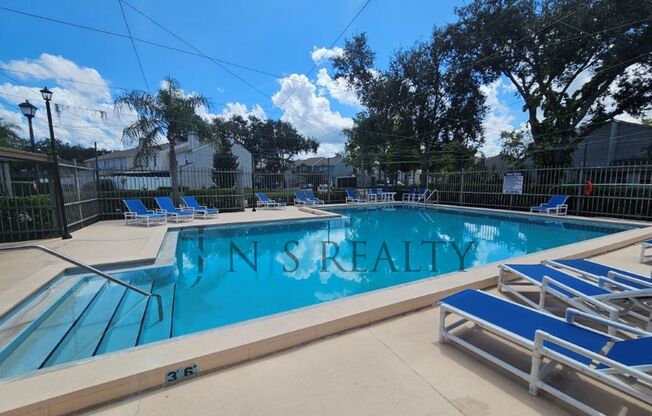LOCATION LOCATION! 2/2 1234 Sq. Ft. with HUGE living room, community pool, indoor laundry and giant screen porch!!
