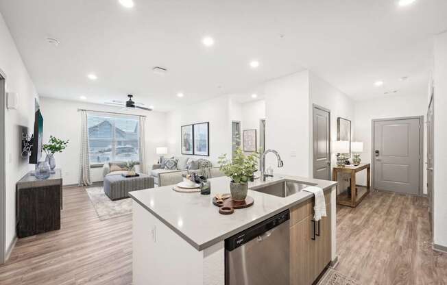 an open floorplan with a kitchen and living room