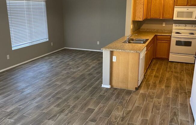 4 bedroom 2.5 bath home in Windmill Village is ready early July move-in !!
