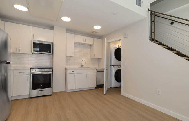 Kitchen with In-home Washer and Dryer