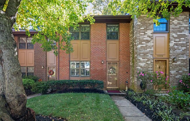 Charming Townhome with Serene Tree-Lined Setting